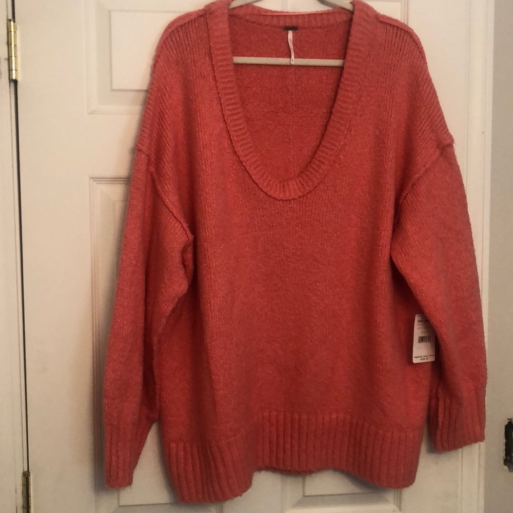 Pink Lightning Free People oversized sweater.